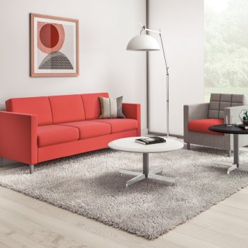 office design layout with red contemporary sofa and grey office chair