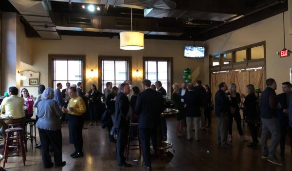 Employees and friends gathered at event hosted by OstermanCron
